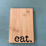 “Eat” bamboo cheese boards